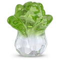 Green glass cabbage sculpture on a white background