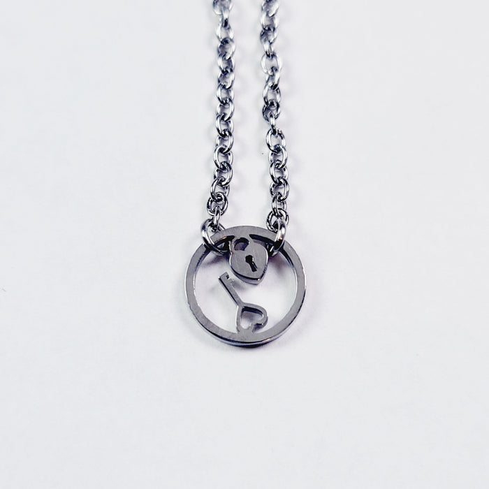 Day Collar, Stainless Steel with Circle of O Heart Locket and Key Pendant. 24/7 Wear Discreet Collar