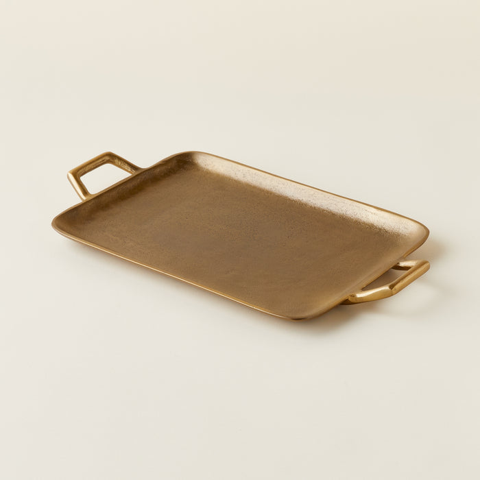 Brass metal tray with handles.